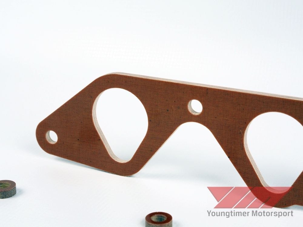 Phenolic spacer for Ford Sierra Pinto 2.0 OHC EFI Phenolic spacer for Ford Sierra Pinto 2.0 OHC EFI