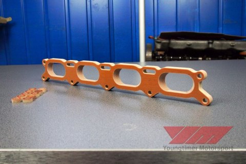 Phenolic transition spacer for VAG 1.8t large port to small port - set Phenolic transition spacer for VAG 1.8t large port to small port - set
