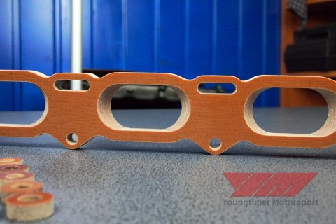 Phenolic transition spacer for VAG 1.8t large port to small port - set Phenolic transition spacer for VAG 1.8t large port to small port - set